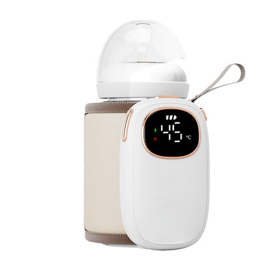 White portable bottle warmer with rose gold accents, digital display showing 45°C, and beige insulated sleeve. - Image 3