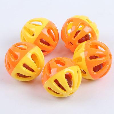 Five colorful plastic pet bell balls in red, yellow/orange, lime green, and hot pink, with hollow designs. - Image 3