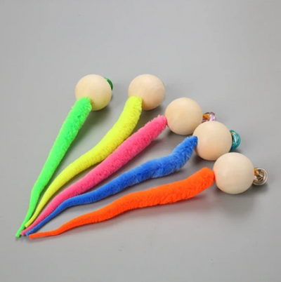 Orange plush cat toy with a wooden ball and a small golden bell, designed for cats to play and nibble. - Image 22