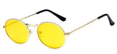 Retro round sunglasses with pink lenses and a gold-colored metal frame, featuring black ear tips. - Image 12