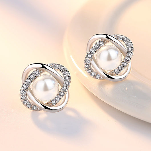 Aretes de Perla Concha con Giro Elegante - Image 2