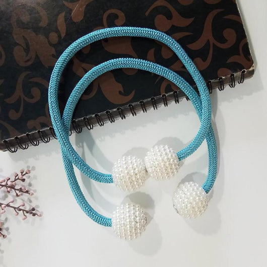 Magenta elastic curtain tieback with two white pearl-beaded spheres, designed to hold curtains elegantly. - Image 6