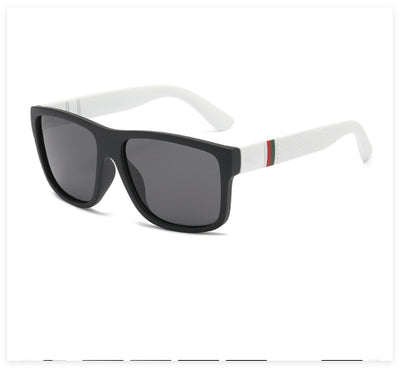 Men's grey plastic frame driving sunglasses with dark polarized lenses and red and black stripe detail on temples. - Image 11