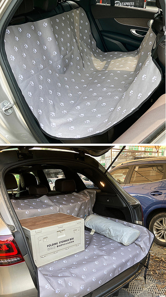 Pink car pet mat with white paw print and bone patterns, featuring black straps for securing to a rear seat. - Image 23