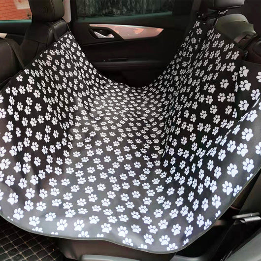 Black Oxford cloth pet car seat cover installed in a car's back seat, forming a hammock to protect upholstery. - Image 6