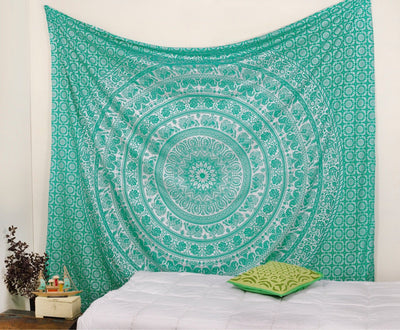 Gold and blue mandala tapestry with elephant and floral patterns, hung above a white quilted bed. - Image 5