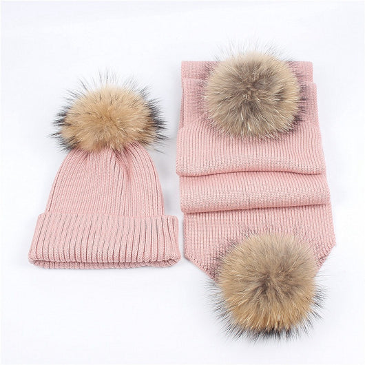 Red knitted hat and scarf set with fluffy brown and black fur pom-poms, ideal for warm winter wear. - Image 15