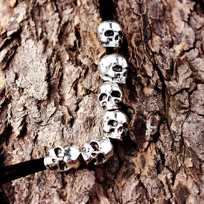 Red velvet rope with six silver-colored skull beads, ideal for DIY hair accessories or crafting projects. - Image 8