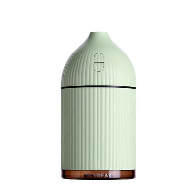 Pink ribbed aromatherapy diffuser and ultrasonic humidifier with a transparent brown base and control buttons. - Image 26