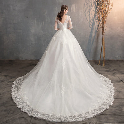 Vestido de Novia con Escote en V, Encaje y Manga Larga - Image 9