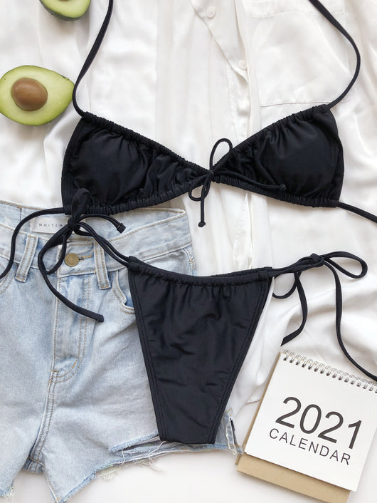 Light blue pleated bikini with triangle top and thong bottom, featuring adjustable tie closures on both pieces. - Image 12