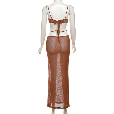 White see-through bikini skirt suit with a mesh bralette top and sheer knit maxi skirt with gold chain details. - Image 29