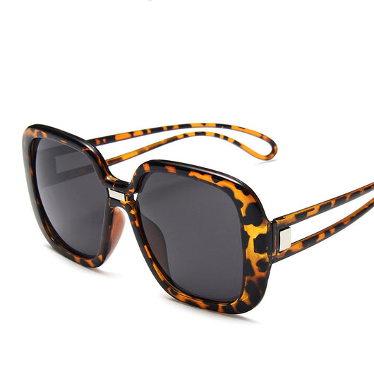 Large frame sunglasses with gradient purple lenses and a blue-to-clear fade on the bottom of the frame. - Image 4