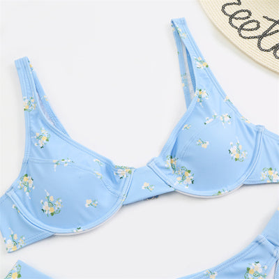 Light blue floral bikini with pink and yellow flowers, featuring an underwire top and high-cut bottom. - Image 10