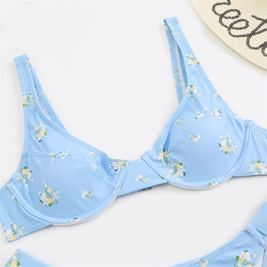 Light blue floral bikini with pink and yellow flowers, featuring an underwire top and high-cut bottom. - Image 10