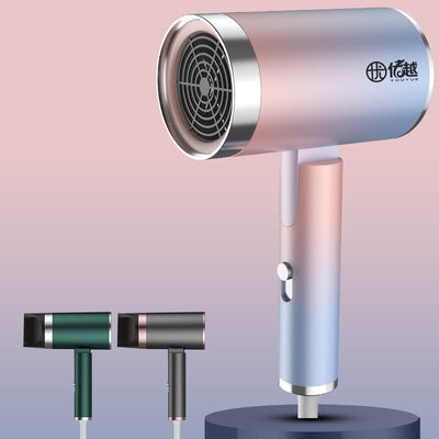 Foldable negative ion hair dryer with a pink to blue gradient finish and silver accents, featuring a single nozzle. - Image 7
