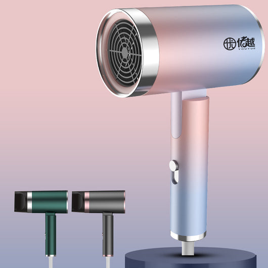 Foldable negative ion hair dryer with a pink to blue gradient finish and silver accents, featuring a single nozzle. - Image 7