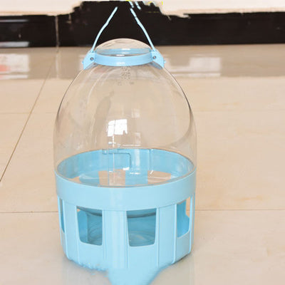 Transparent pet drinker with a light blue base and handle, designed for chickens or small birds. - Image 55