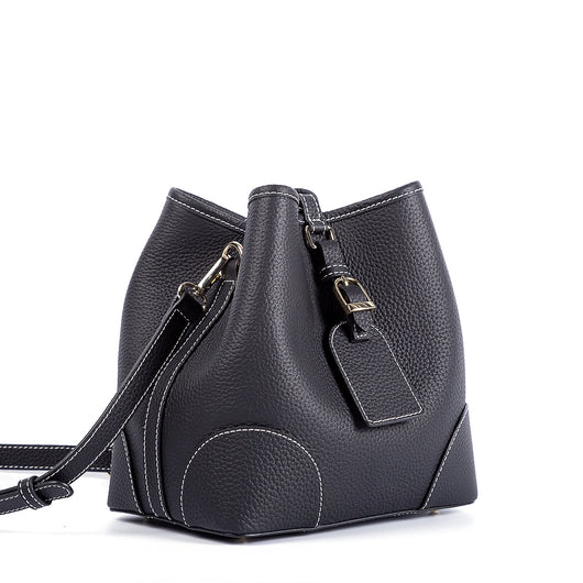 Bolso Cubo Retro de Cuero Genuino con Patrón Grabado y Cordón Ajustable - Image 16