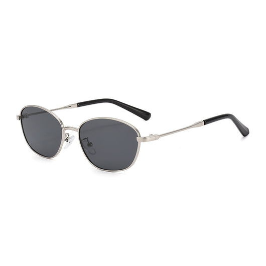 Small oval metal sunglasses for women with a gold frame and brown gradient lenses, featuring black temple tips. - Image 6