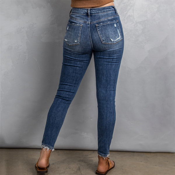 Jeans Ajustados de Cintura Alta con Orillo Desgastado para Mujer