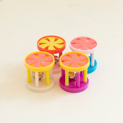 Colorful plastic cat bell roller toy with yellow and orange wheel, white and yellow rods, and a white end cap. - Image 11