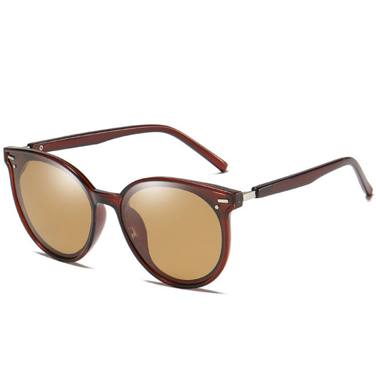 Transparent gray round frame polarized sunglasses with black-gray lenses on a white background. - Image 13