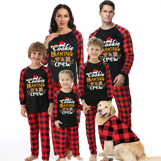 Baby black romper with red plaid sleeves and cuffs, featuring a "Cookie Baking Crew" graphic with Christmas icons.