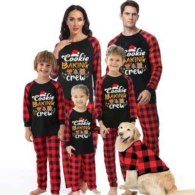 Baby black romper with red plaid sleeves and cuffs, featuring a "Cookie Baking Crew" graphic with Christmas icons.
