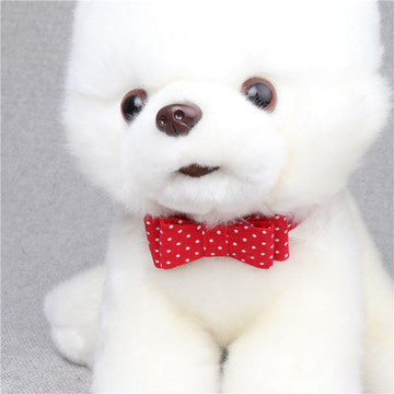 Two pet collars with blue, white, and tan camouflage bowknots and brown lining on a white background. - Image 10