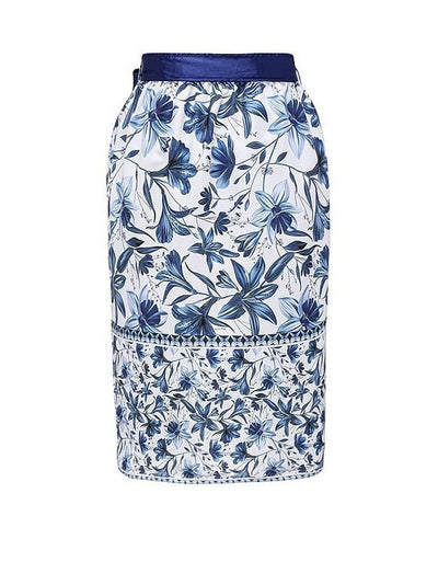 Women's white one-piece swimsuit with deep V-neck, blue floral and geometric patterns, and tie-shoulder straps. - Image 17
