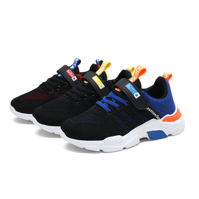 Boy's black and blue sports shoes with orange accents, mesh upper, white sole, blue laces, and a Velcro strap. - Image 29