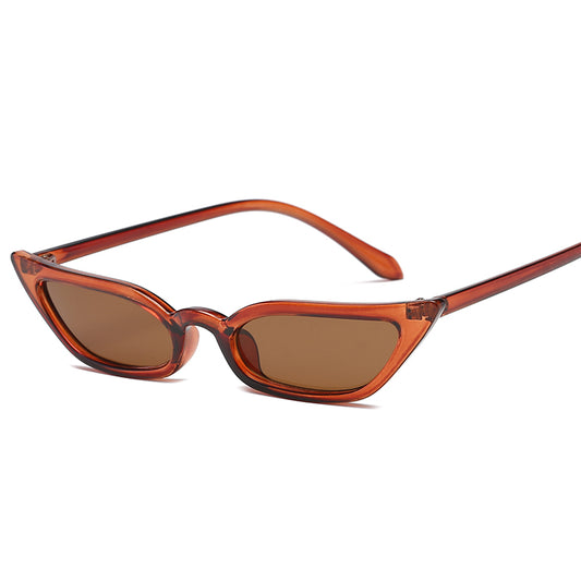 Red small frame cat-eye sunglasses with red tinted lenses on a white background. - Image 2