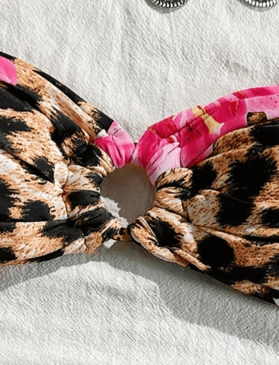 Women's tube top bikini swimsuit with a pink floral and leopard print, featuring a twisted front top and high-cut ruched bottom. - Image 10