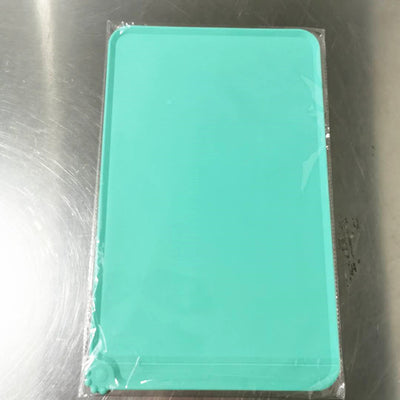 Blue rectangular silicone pet placemat with a raised edge and a small paw print detail in the corner. - Image 5