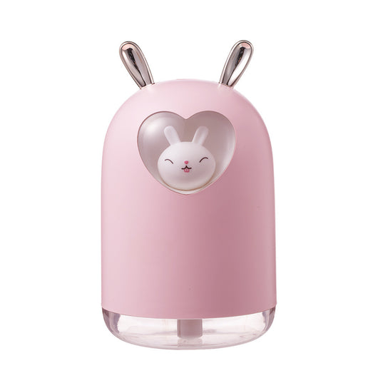 White rabbit humidifier with rose gold ears, a heart-shaped cutout, and a smiling bunny figure inside. - Image 13