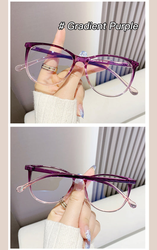 Black full-frame round anti-blue light glasses held by a hand with a gold ring and light blue gradient nails. - Image 14