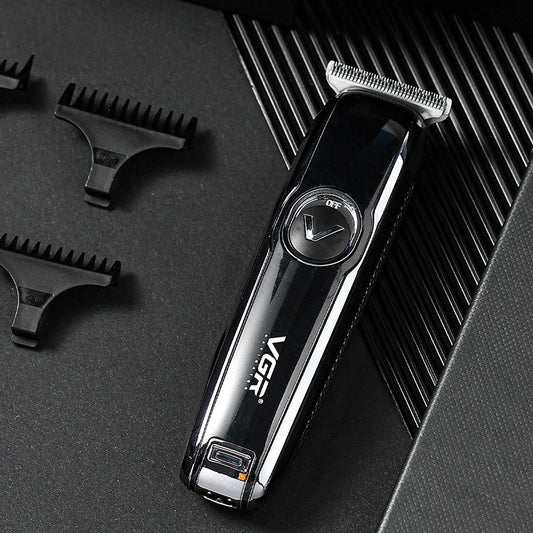 Black VGR rechargeable hair trimmer with silver blade, USB charging cable, cleaning brush, oil, and three guide combs (1mm, 2mm, 3mm).