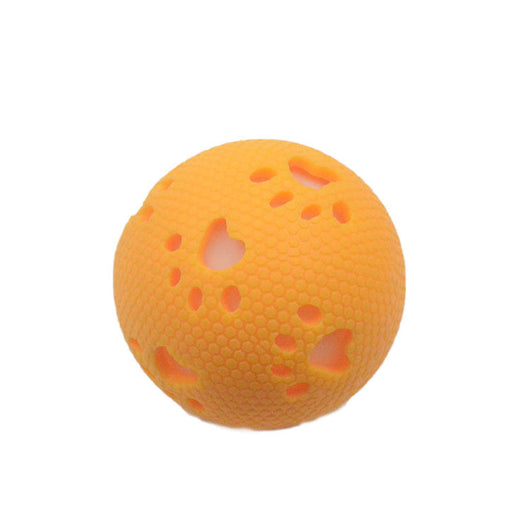 Green TPR hollow pet ball with honeycomb texture and paw print cutouts, designed for play. - Image 2