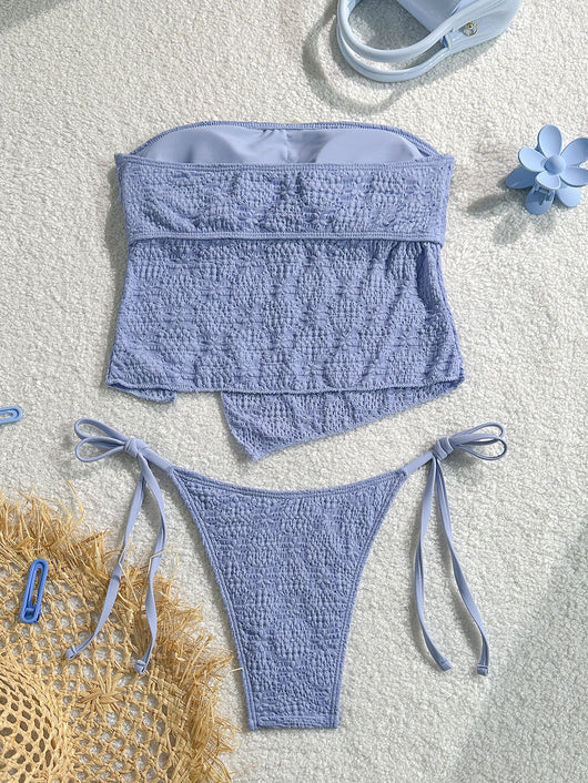 Light blue textured two-piece bikini with a strapless top and high-cut bottom with side ties and white bows. - Image 4