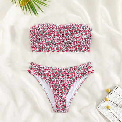 Floral smocked strapless bandeau bikini with high-cut bottoms featuring side straps, in white, teal, and red. - Image 8
