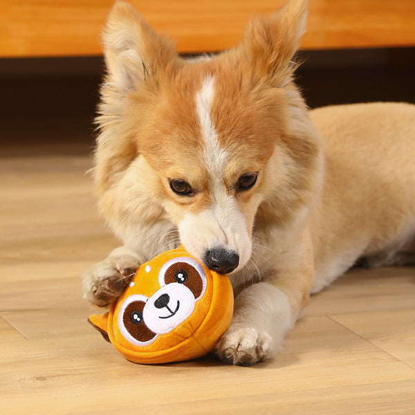 Plush pet toy shaped like a cartoon cow's head, featuring white, black, pink, and brown colors for dogs and cats.