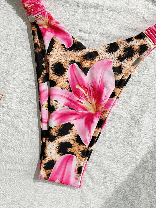 Women's tube top bikini swimsuit with a pink floral and leopard print, featuring a twisted front top and high-cut ruched bottom. - Image 2