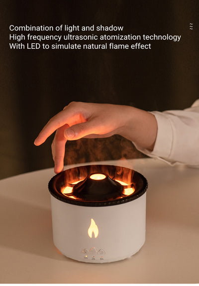 White ultrasonic essential oil diffuser with orange flame effect mist, alongside a gift set of Lavender, Peppermint, Tea Tree, and Sweet Orange essential oils. - Image 18