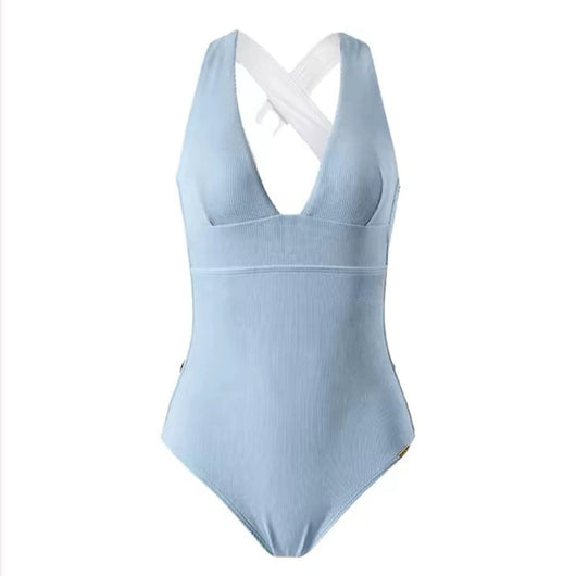 Light blue ribbed one-piece swimsuit with a deep V-neck and halter straps, modeled on a person. - Image 5