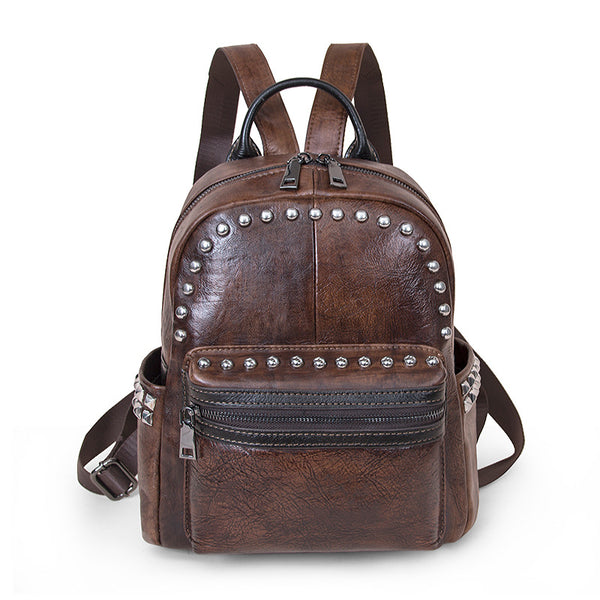 Mochila de Cuero Genuino Retro para Mujer - Diseño Artesanal con Remaches, Gran Capacidad y Estilo Vintage