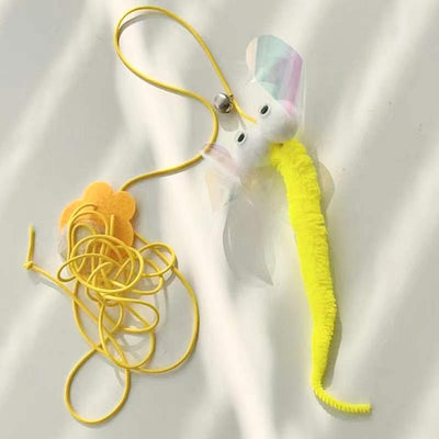 Colorful cat toy with pom-poms, googly eyes, white feathers, and a yellow elastic rope with a suction cup. - Image 16