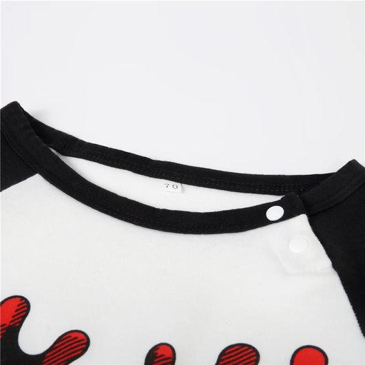White long-sleeve pajama top with "wild one" graphic and red and black plaid pants. - Image 32