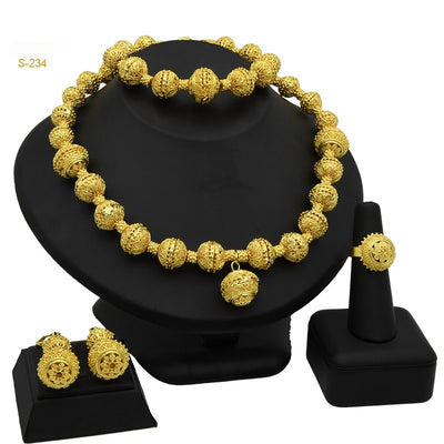 Women's four-piece jewelry set with matte gold teardrop links and white pearls, including a necklace, earrings, ring, and bracelet. - Image 3