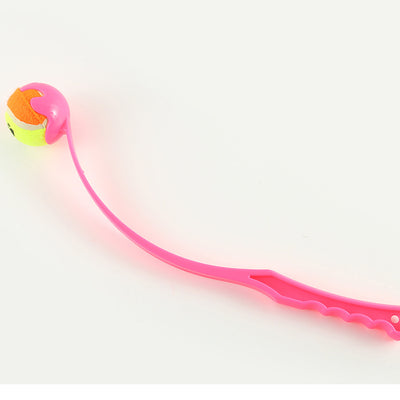 Pink pet throwing cue with a yellow and orange tennis ball, designed for outdoor dog training and play. - Image 5